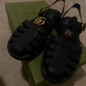 Gucci Black Sandals with Gold Buckle